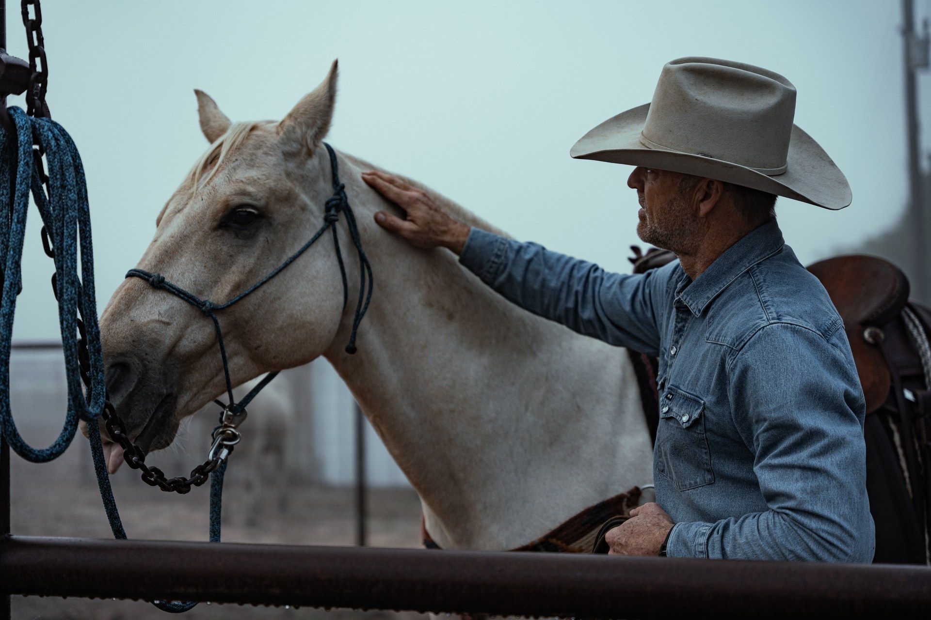 A cowboy on horseback at Oak Hills Ranch in the Texas Hill Country.